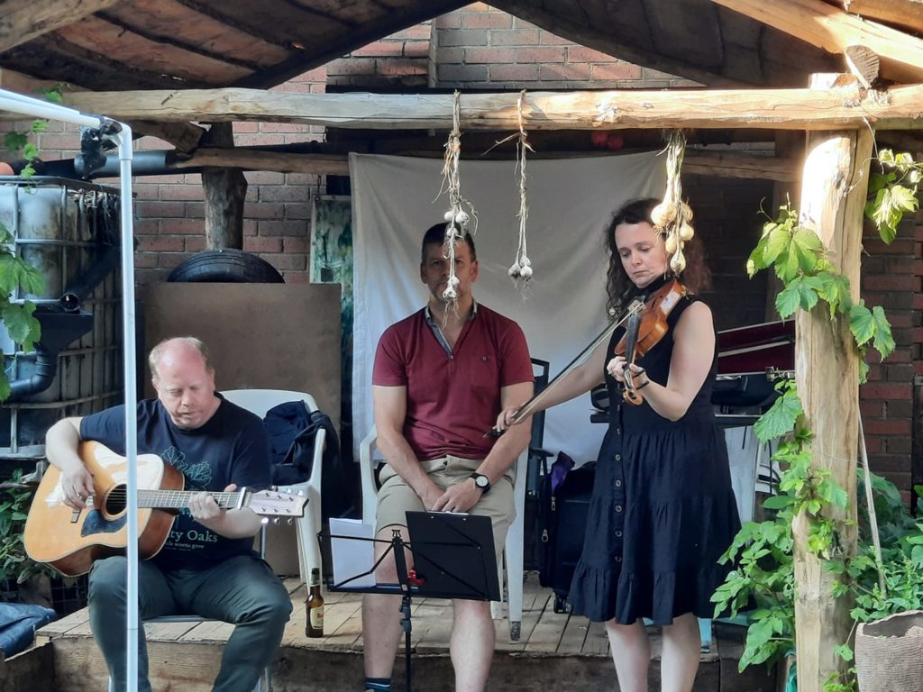 Joe Peacock performing in Digbeth Community Garden